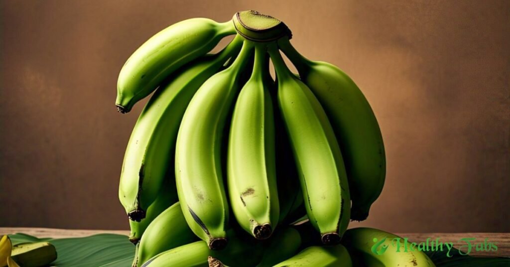 A bunch of fresh green bananas placed on a wooden surface, highlighting their nutritional benefits.